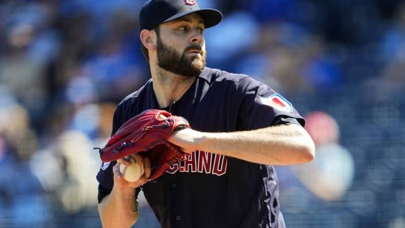 Sep 20, 2023; Kansas City, Missouri, USA; Cleveland Guardians starting pitcher Lucas Giolito (27) pitches during the first inning against the Kansas City Royals at Kauffman Stadium. Mandatory Credit: Jay Biggerstaff-USA TODAY Sports