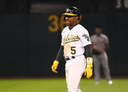 Sep 22, 2023; Oakland, California, USA; Oakland Athletics left fielder Tony Kemp (5) walks off an injury during the sixth inning against the Detroit Tigers at Oakland-Alameda County Coliseum. Mandatory Credit: Kelley L Cox-USA TODAY Sports
