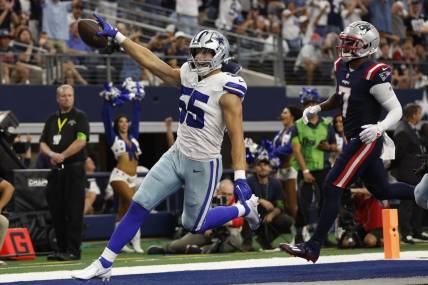 Oct 1, 2023; Arlington, Texas, USA; Dallas Cowboys linebacker Leighton Vander Esch (55) returns a fumble for a touchdown in the second quarter against the New England Patriots at AT&T Stadium. Mandatory Credit: Tim Heitman-USA TODAY Sports