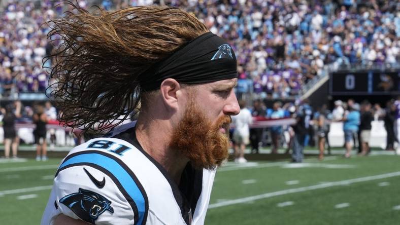 Oct 1, 2023; Charlotte, North Carolina, USA; Carolina Panthers tight end Hayden Hurst (81) runs on to the field before the game at Bank of America Stadium. Mandatory Credit: Bob Donnan-USA TODAY Sports