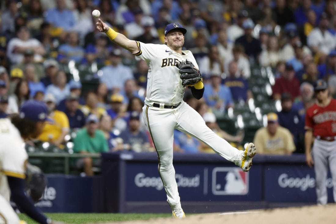 Oct 4, 2023; Milwaukee, Wisconsin, USA; Milwaukee Brewers third baseman Josh Donaldson (3) throws to first in the fourth inning against the Arizona Diamondbacks during game two of the Wildcard series for the 2023 MLB playoffs at American Family Field. Mandatory Credit: Kamil Krzaczynski-USA TODAY Sports