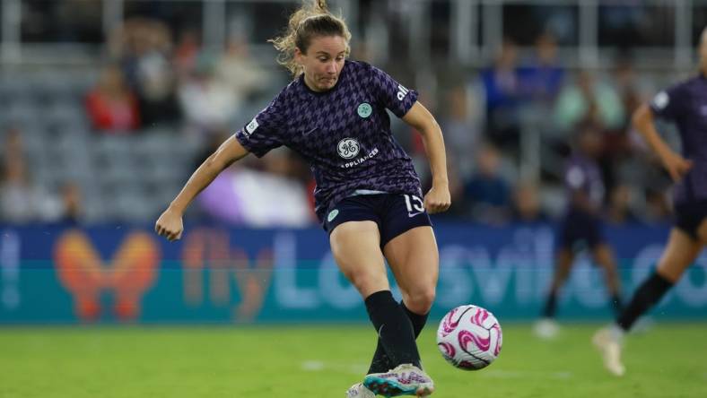 Oct 6, 2023; Louisville, Kentucky, USA; Racing Louisville FC defender Julia Lester (15) passes the ball in the second half against the Orlando Pride at Lynn Family Stadium. Mandatory Credit: EM Dash-USA TODAY Sports