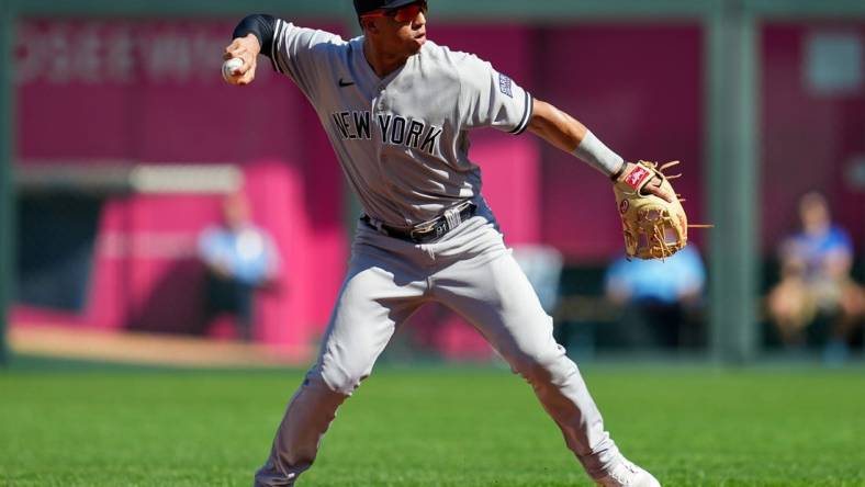 Oct 1, 2023; Kansas City, Missouri, USA; New York Yankees second baseman Oswald Peraza (91) throws to first base during the first inning against the Kansas City Royals at Kauffman Stadium. Mandatory Credit: Jay Biggerstaff-USA TODAY Sports