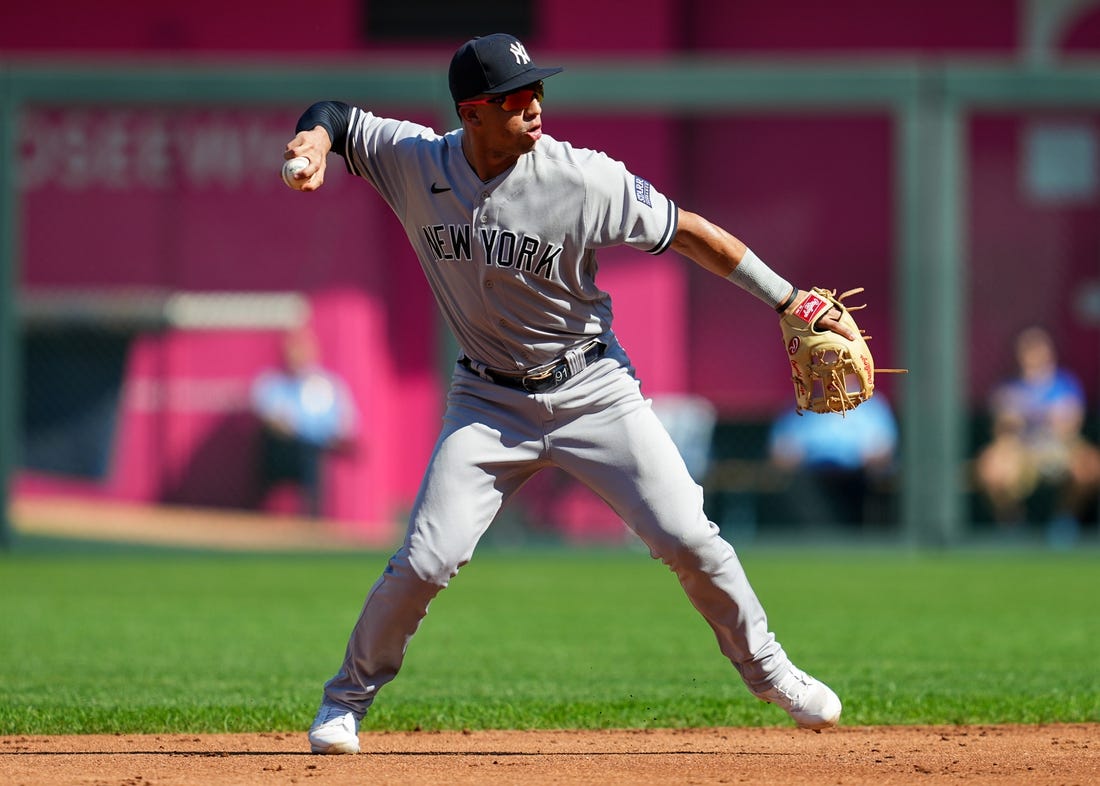 Oct 1, 2023; Kansas City, Missouri, USA; New York Yankees second baseman Oswald Peraza (91) throws to first base during the first inning against the Kansas City Royals at Kauffman Stadium. Mandatory Credit: Jay Biggerstaff-USA TODAY Sports