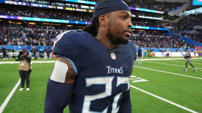 Oct 15, 2023; London, United Kingdom; Tennessee Titans running back Derrick Henry (22) leaves the field after an NFL International Series game against the Baltimore Ravens at Tottenham Hotspur Stadium. Mandatory Credit: Kirby Lee-USA TODAY Sports