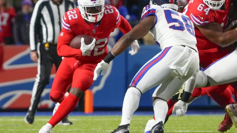 Oct 15, 2023; Orchard Park, New York, USA; New York Giants linebacker Bobby Okereke (58) tackles Buffalo Bills running back Damien Harris (22) during the first half at Highmark Stadium. Mandatory Credit: Gregory Fisher-USA TODAY Sports