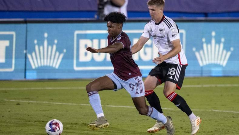 Oct 14, 2023; Frisco, TX, USA; Colorado Rapids midfielder Ralph Priso (97) and FC Dallas midfielder Liam Fraser (18) in action during the game between FC Dallas and the Colorado Rapids at Toyota Stadium. Mandatory Credit: Jerome Miron-USA TODAY Sports