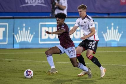 Oct 14, 2023; Frisco, TX, USA; Colorado Rapids midfielder Ralph Priso (97) and FC Dallas midfielder Liam Fraser (18) in action during the game between FC Dallas and the Colorado Rapids at Toyota Stadium. Mandatory Credit: Jerome Miron-USA TODAY Sports