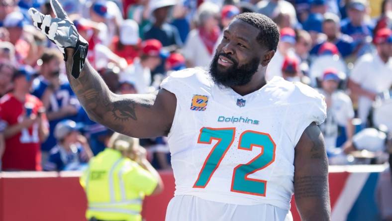 Oct 1, 2023; Orchard Park, New York, USA; Miami Dolphins offensive tackle Terron Armstead (72) reacts to the crowd before a game against the Buffalo Bills at Highmark Stadium. Mandatory Credit: Mark Konezny-USA TODAY Sports