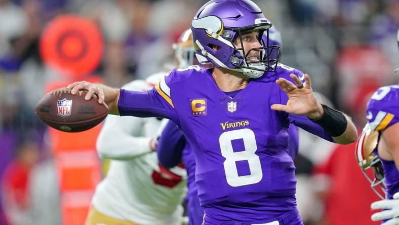 Oct 23, 2023; Minneapolis, Minnesota, USA; Minnesota Vikings quarterback Kirk Cousins (8) passes against the San Francisco 49ers in the first quarter at U.S. Bank Stadium. Mandatory Credit: Brad Rempel-USA TODAY Sports