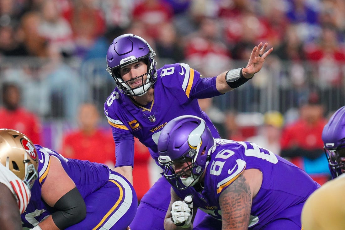 Oct 23, 2023; Minneapolis, Minnesota, USA; Minnesota Vikings quarterback Kirk Cousins (8) signals his team against the San Francisco 49ers in the third quarter at U.S. Bank Stadium. Mandatory Credit: Brad Rempel-USA TODAY Sports