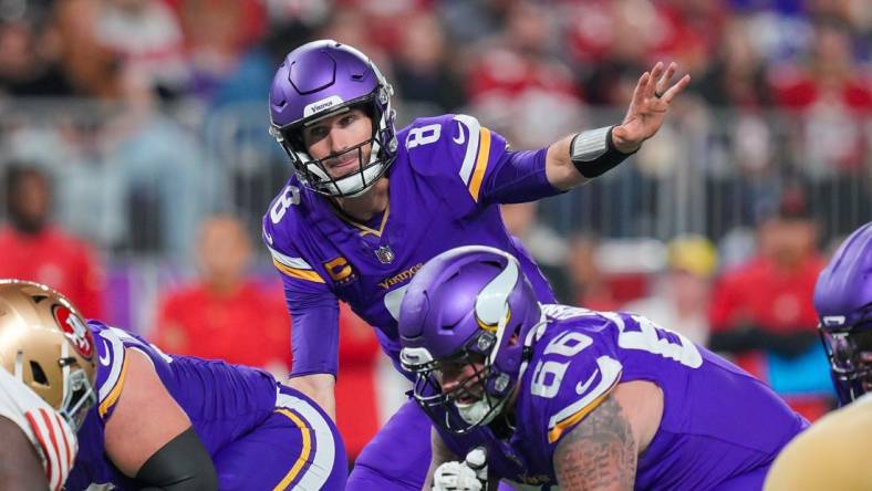 Oct 23, 2023; Minneapolis, Minnesota, USA; Minnesota Vikings quarterback Kirk Cousins (8) signals his team against the San Francisco 49ers in the third quarter at U.S. Bank Stadium. Mandatory Credit: Brad Rempel-USA TODAY Sports