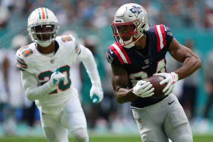 Oct 29, 2023; Miami Gardens, Florida, USA; New England Patriots wide receiver Kendrick Bourne (84) runs the ball for a touchdown against the Miami Dolphins during the first half at Hard Rock Stadium. Mandatory Credit: Jasen Vinlove-USA TODAY Sports