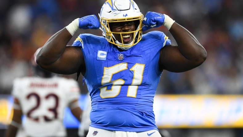 Oct 29, 2023; Inglewood, California, USA; Los Angeles Chargers defensive tackle Sebastian Joseph-Day (51) celebrates after a fourth down stop against the Chicago Bears during third quarter at SoFi Stadium. Mandatory Credit: Jonathan Hui-USA TODAY Sports