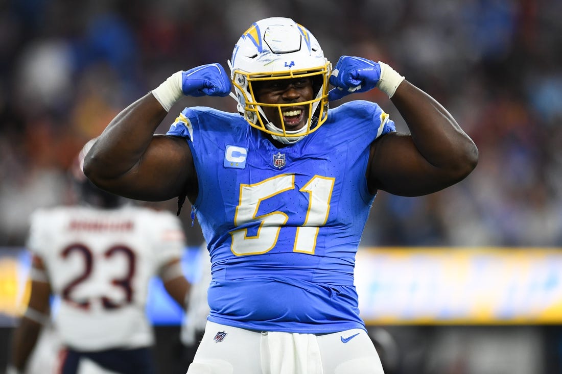 Oct 29, 2023; Inglewood, California, USA; Los Angeles Chargers defensive tackle Sebastian Joseph-Day (51) celebrates after a fourth down stop against the Chicago Bears during third quarter at SoFi Stadium. Mandatory Credit: Jonathan Hui-USA TODAY Sports