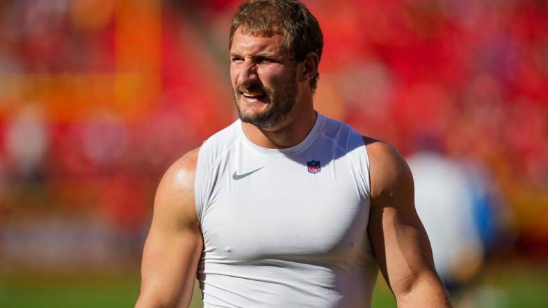 Oct 22, 2023; Kansas City, Missouri, USA; Los Angeles Chargers linebacker Joey Bosa (97) warms up prior to a game against the Kansas City Chiefs at GEHA Field at Arrowhead Stadium. Mandatory Credit: Jay Biggerstaff-USA TODAY Sports