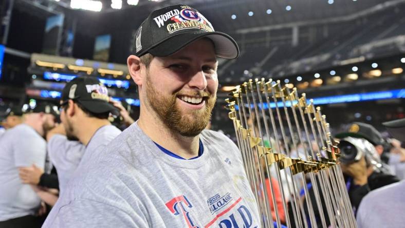 Nov 1, 2023; Phoenix, AZ, USA; Texas Rangers starting pitcher Jordan Montgomery (52) celebrates defeating the Arizona Diamondbacks to win the World Series  in game five of the 2023 World Series at Chase Field. Mandatory Credit: Matt Kartozian-USA TODAY Sports