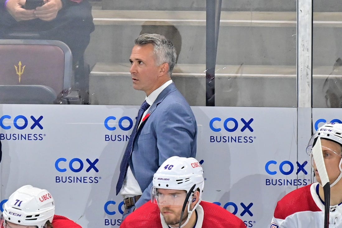 Nov 2, 2023; Tempe, Arizona, USA;  Montreal Canadiens head coach Martin St-Louis looks on in the third period against the Arizona Coyotes at Mullett Arena. Mandatory Credit: Matt Kartozian-USA TODAY Sports