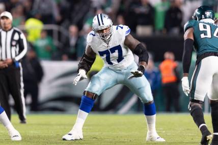 Nov 5, 2023; Philadelphia, Pennsylvania, USA; Dallas Cowboys offensive tackle Tyron Smith (77) in action against the Philadelphia Eagles at Lincoln Financial Field. Mandatory Credit: Bill Streicher-USA TODAY Sports