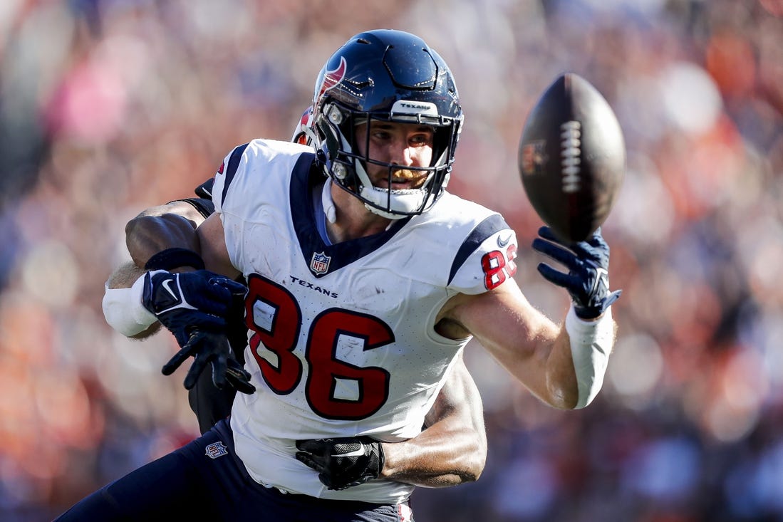 Nov 12, 2023; Cincinnati, Ohio, USA;  Houston Texans tight end Dalton Schultz (86) attempts to catch a pass against Cincinnati Bengals safety Dax Hill (23) in the first half at Paycor Stadium. Mandatory Credit: Katie Stratman-USA TODAY Sports