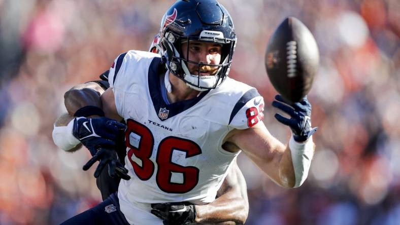 Nov 12, 2023; Cincinnati, Ohio, USA;  Houston Texans tight end Dalton Schultz (86) attempts to catch a pass against Cincinnati Bengals safety Dax Hill (23) in the first half at Paycor Stadium. Mandatory Credit: Katie Stratman-USA TODAY Sports