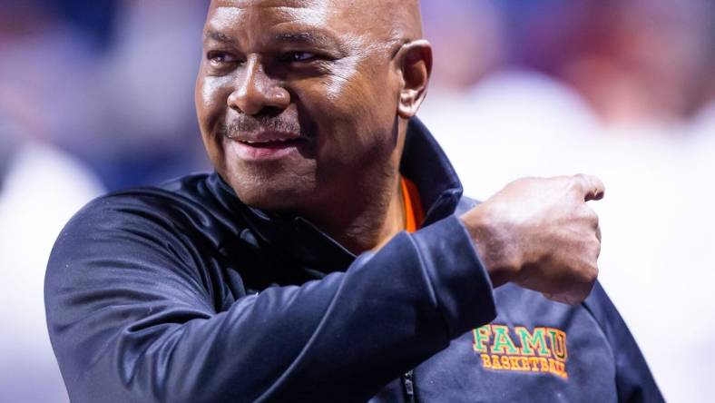 Florida A&M Rattlers head coach Robert McCullum coaches from the sidelines. The Florida mens basketball team hosted Florida A&M at Exactech Arena at the Stephen C. O   Connell Center in Gainesville, FL on Tuesday, November 14, 2023 in the first half. [Doug Engle/Ocala Star Banner]