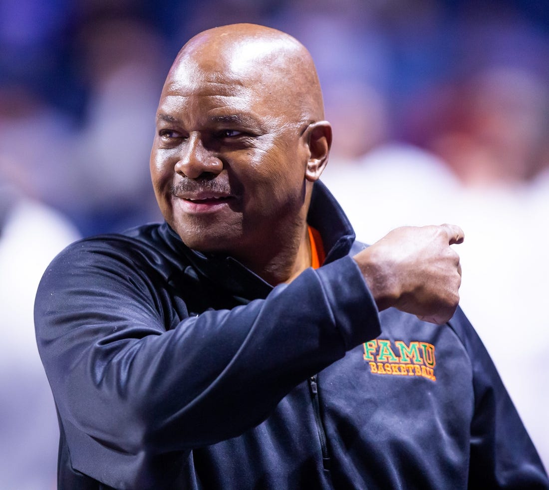 Florida A&M Rattlers head coach Robert McCullum coaches from the sidelines. The Florida mens basketball team hosted Florida A&M at Exactech Arena at the Stephen C. O   Connell Center in Gainesville, FL on Tuesday, November 14, 2023 in the first half. [Doug Engle/Ocala Star Banner]