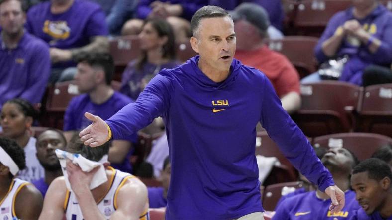 Nov 17, 2023; Charleston, SC, USA; LSU Tigers head coach Matt McMahon reacts to action on the court in the first half against the North Texas Mean Green at TD Arena. Mandatory Credit: David Yeazell-USA TODAY Sports