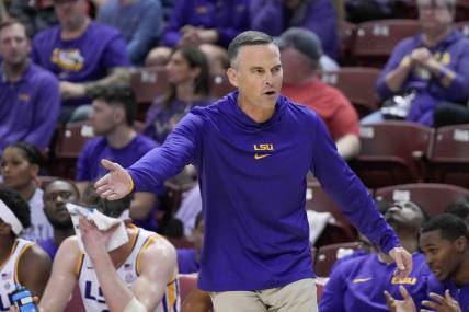 Nov 17, 2023; Charleston, SC, USA; LSU Tigers head coach Matt McMahon reacts to action on the court in the first half against the North Texas Mean Green at TD Arena. Mandatory Credit: David Yeazell-USA TODAY Sports