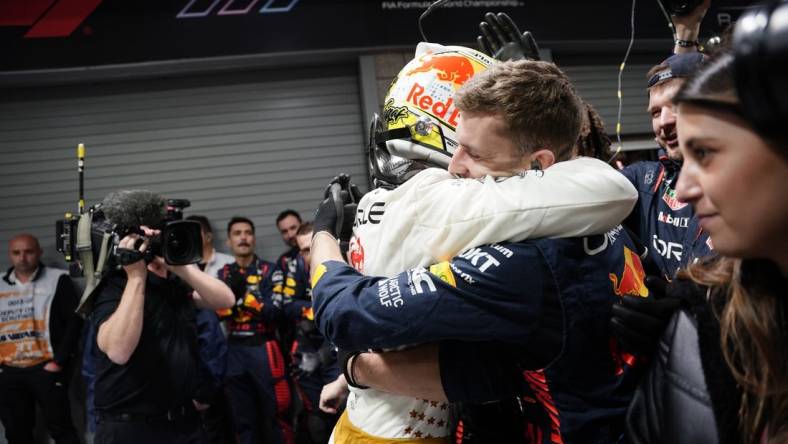 Nov 18, 2023; Las Vegas, Nevada, USA; Red Bull Racing Honda driver Max Verstappen of Netherlands (1) celebrates with his team after winning the Formula 1 Heineken Silver Las Vegas Grand Prix at the Las Vegas Strip Circuit. Mandatory Credit: Lucas Peltier-USA TODAY Sports