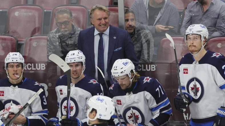 Nov 24, 2023; Sunrise, Florida, USA; Winnipeg Jets head coach Rick Bowness looks on from the bench against the Florida Panthers during the third period at Amerant Bank Arena. Mandatory Credit: Sam Navarro-USA TODAY Sports