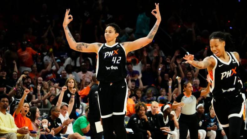 Phoenix Mercury center Brittney Griner (42) reacts after making a 3-pointer during the home opener against the Chicago Sky in the second half at Footprint Center on May 21, 2023.