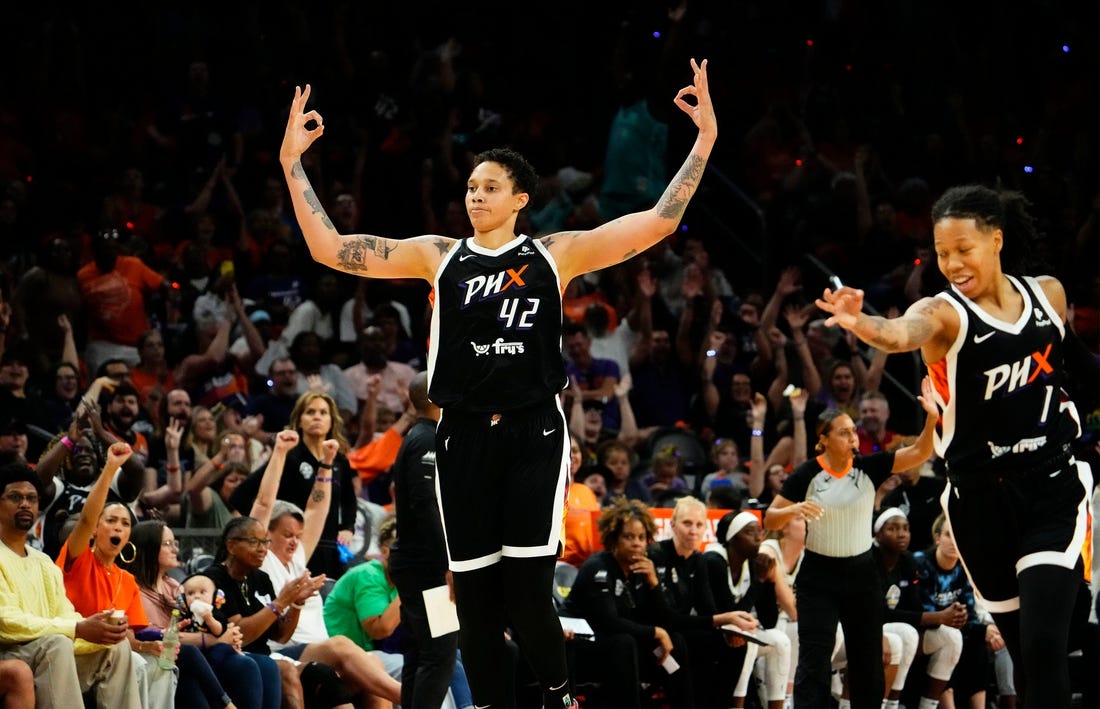 Phoenix Mercury center Brittney Griner (42) reacts after making a 3-pointer during the home opener against the Chicago Sky in the second half at Footprint Center on May 21, 2023.