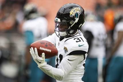 Dec 10, 2023; Cleveland, Ohio, USA; Jacksonville Jaguars cornerback Darious Williams (31) catches the ball during warm ups before the game against the Cleveland Browns at Cleveland Browns Stadium. Mandatory Credit: Scott Galvin-USA TODAY Sports