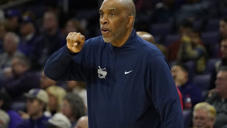 Dec 10, 2023; Evanston, Illinois, USA; Detroit Mercy Titans head coach Mike Davis gestures to his team during the first half at Welsh-Ryan Arena. Mandatory Credit: David Banks-USA TODAY Sports