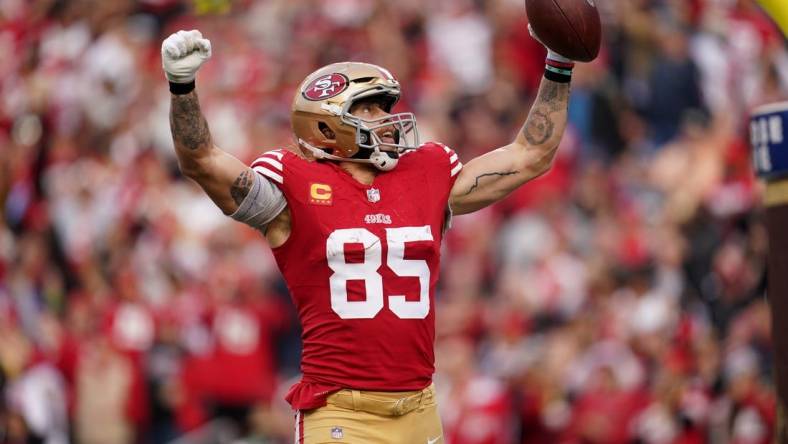 Dec 10, 2023; Santa Clara, California, USA; San Francisco 49ers tight end George Kittle (85) celebrates after scoring a touchdown against the Seattle Seahawks in the fourth quarter at Levi's Stadium. Mandatory Credit: Cary Edmondson-USA TODAY Sports