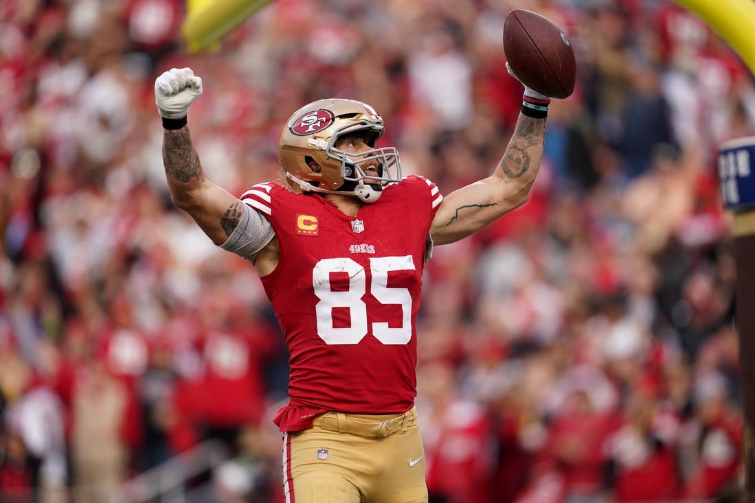 Dec 10, 2023; Santa Clara, California, USA; San Francisco 49ers tight end George Kittle (85) celebrates after scoring a touchdown against the Seattle Seahawks in the fourth quarter at Levi's Stadium. Mandatory Credit: Cary Edmondson-USA TODAY Sports