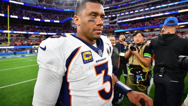 Dec 10, 2023; Inglewood, California, USA;  Denver Broncos quarterback Russell Wilson (3) reacts following the victory against the Los Angeles Chargers at SoFi Stadium. Mandatory Credit: Gary A. Vasquez-USA TODAY Sports