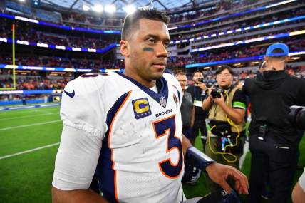 Dec 10, 2023; Inglewood, California, USA;  Denver Broncos quarterback Russell Wilson (3) reacts following the victory against the Los Angeles Chargers at SoFi Stadium. Mandatory Credit: Gary A. Vasquez-USA TODAY Sports