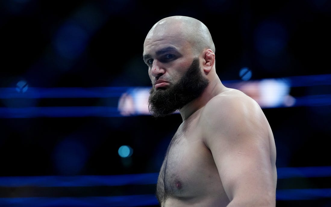 Dec 16, 2023; Las Vegas, Nevada, USA; Shamil Gaziev (blue gloves) during UFC 296 at T-Mobile Arena. Mandatory Credit: Stephen R. Sylvanie-USA TODAY Sports