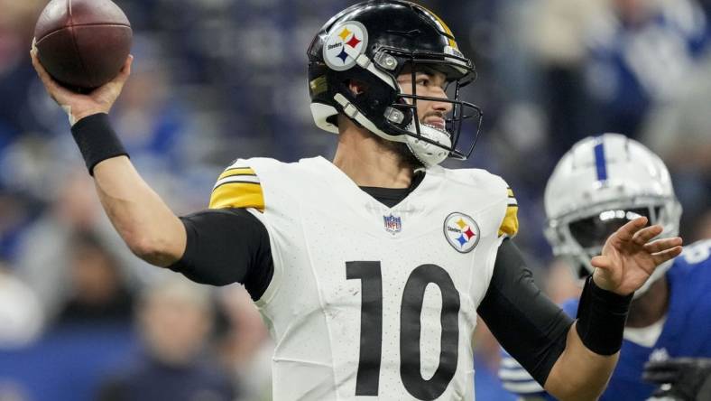 Dec 16, 2023; Indianapolis, Indiana, USA; Pittsburgh Steelers quarterback Mitch Trubisky (10) draws back to pass against the Pittsburgh Steelers at Lucas Oil Stadium. Mandatory Credit: Grace Hollars-USA TODAY Sports