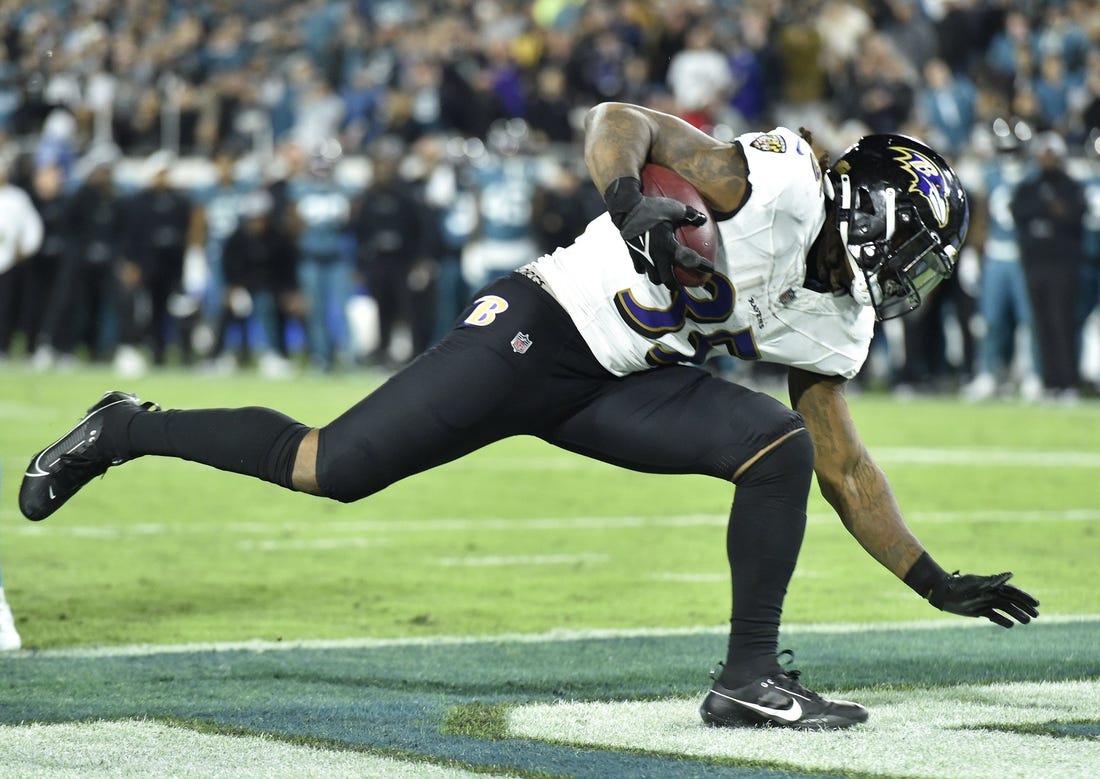 Baltimore Ravens running back Gus Edwards (35) goes into the end zone for an early fourth quarter touchdown. The Jacksonville Jaguars hosted the Baltimore Ravens at EverBank Stadium in Jacksonville, Florida Sunday Night, December 17, 2023. The Jaguars trailed 10 to 0 at the half and lost 23 to 7. [Bob Self/Florida Times-Union]