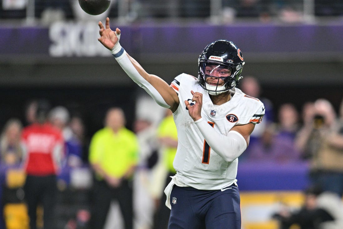 Nov 27, 2023; Minneapolis, Minnesota, USA; Chicago Bears quarterback Justin Fields (1) throws a pass during the game against the Minnesota Vikings at U.S. Bank Stadium. Mandatory Credit: Jeffrey Becker-USA TODAY Sports