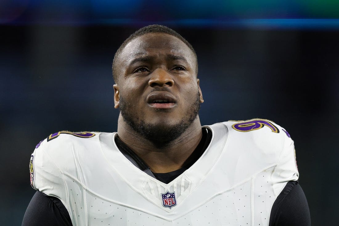 Dec 17, 2023; Jacksonville, Florida, USA;  Baltimore Ravens defensive tackle Justin Madubuike (92) warms up before a game against the Jacksonville Jaguars at EverBank Stadium. Mandatory Credit: Nathan Ray Seebeck-USA TODAY Sports
