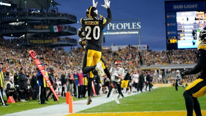 Dec 23, 2023; Pittsburgh, PA, USA; Pittsburgh Steelers cornerback Patrick Peterson (20) intercepts a pass in the first quarter during a Week 16 NFL football game between the Cincinnati Bengals and the Pittsburgh Steelers at Acrisure Stadium. Mandatory Credit: Kareem Elgazzar-USA TODAY Sports