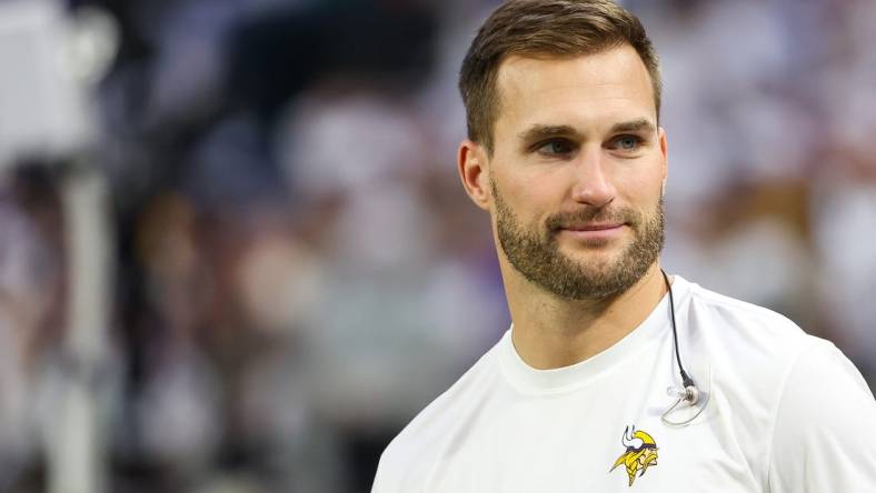 Dec 24, 2023; Minneapolis, Minnesota, USA; Minnesota Vikings quarterback Kirk Cousins (8) looks on from the bench during the second quarter against the Detroit Lions at U.S. Bank Stadium. Mandatory Credit: Matt Krohn-USA TODAY Sports