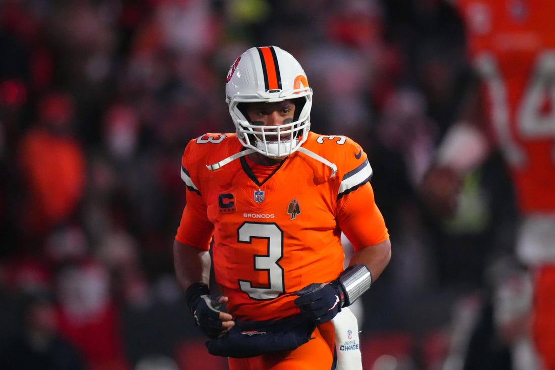 Dec 24, 2023; Denver, Colorado, USA; Denver Broncos quarterback Russell Wilson (3) before the game against the New England Patriots at Empower Field at Mile High. Mandatory Credit: Ron Chenoy-USA TODAY Sports