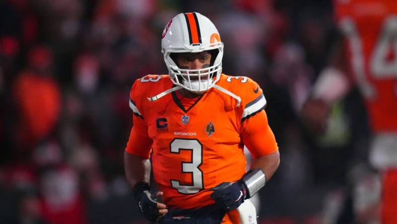 Dec 24, 2023; Denver, Colorado, USA; Denver Broncos quarterback Russell Wilson (3) before the game against the New England Patriots at Empower Field at Mile High. Mandatory Credit: Ron Chenoy-USA TODAY Sports