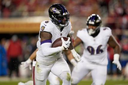 Dec 25, 2023; Santa Clara, California, USA; Baltimore Ravens linebacker Patrick Queen (6) runs with the ball after intercepting a pass against the San Francisco 49ers in the third quarter at Levi's Stadium. Mandatory Credit: Cary Edmondson-USA TODAY Sports