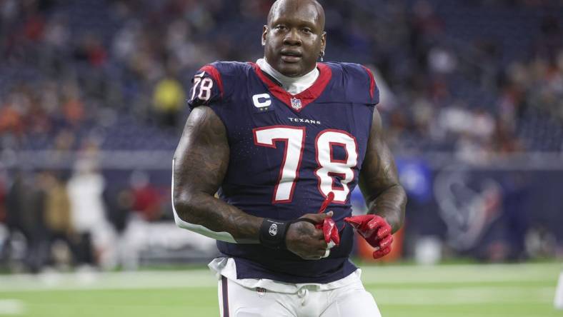 Dec 24, 2023; Houston, Texas, USA; Houston Texans offensive tackle Laremy Tunsil (78) walks off the field before the game against the Cleveland Browns at NRG Stadium. Mandatory Credit: Troy Taormina-USA TODAY Sports